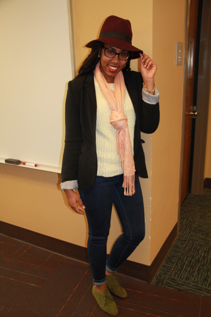 Angela Ward, Social Work Major.  Wearing a hat from Cotton On, scarf and jeans from Charlotte Russe, and a thrifted sweater and blazer.