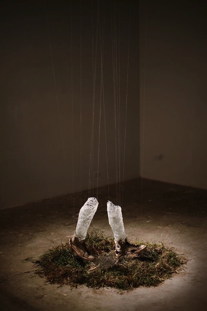 “Deductive Reasoning”, 2013 – (Glass, white sneakers worn from August 2012 to August 2013, plastic, mylar, grass, water, jewelry string)