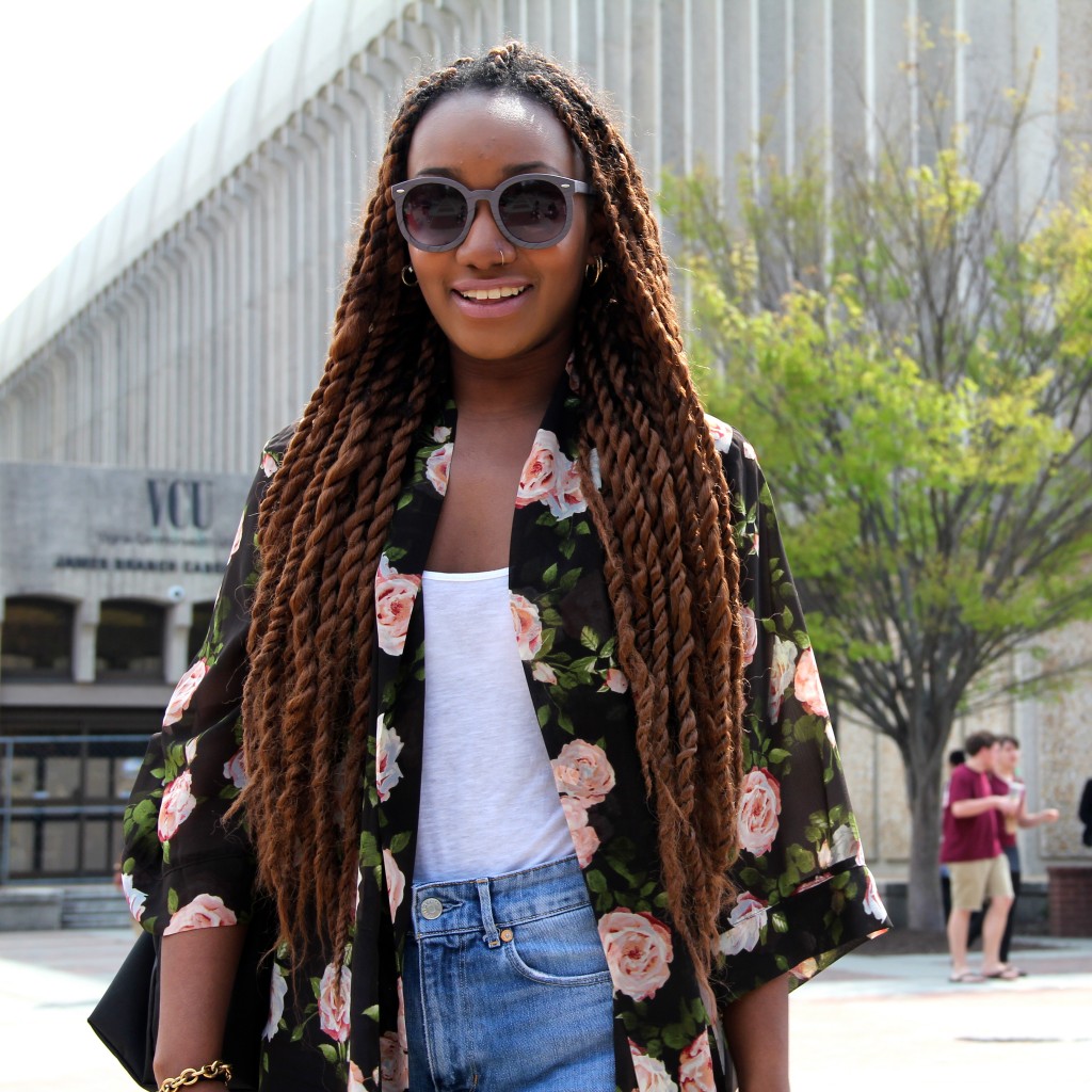 Nia Haynes, History major, wearing a Forever 21 Kimono and sunglasses from Rumors Thrift boutique.